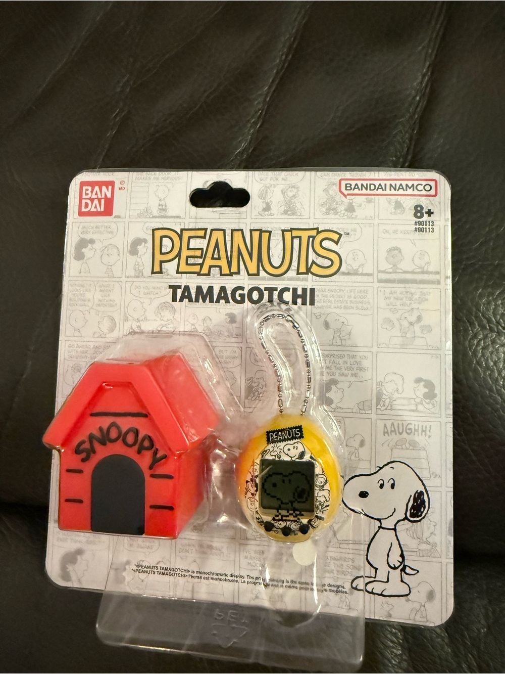 Peanuts Tamagotchi Keychain with Red Snoopy House